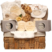 Sunny the Giraffe baby hamper with neutral baby essentials and giraffe theme