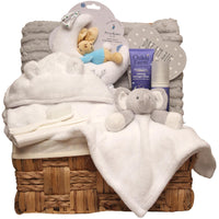 Luxury unisex newborn bedtime hamper featuring neutral blanket, comforter, soft toy and calming baby skincare