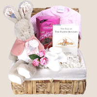 baby girl gift hamper with flopsy bunny baby essentials and chocolates for new mum