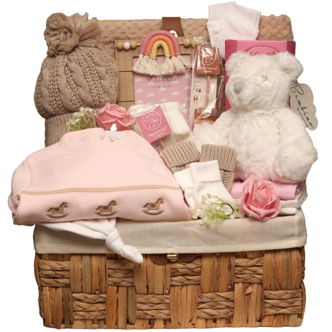 baby girl hamper with baby clothes and gifts for the new mum