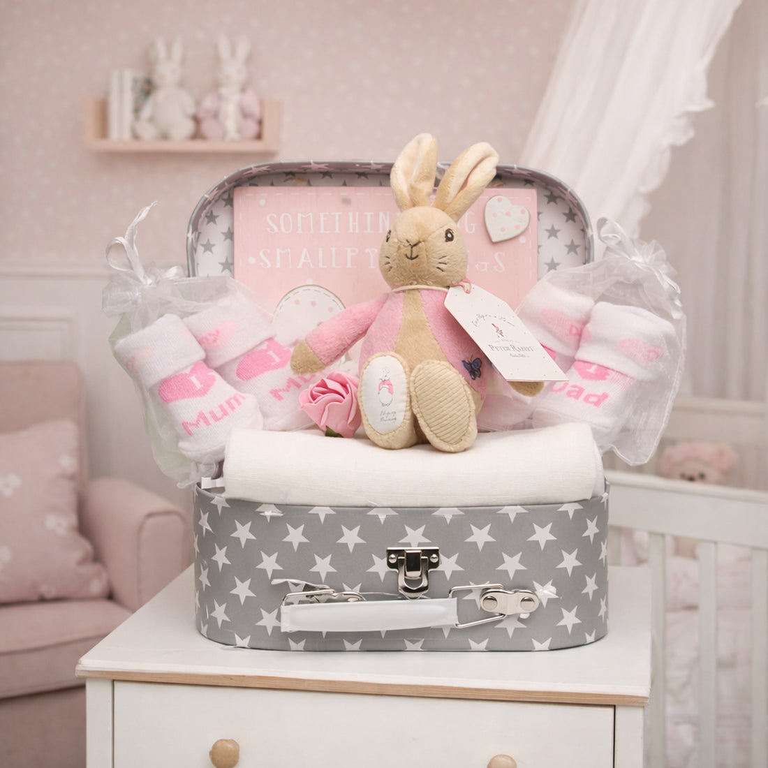 Flopsy-baby-girl-suitcase-with-baby-essentials-and-plaque