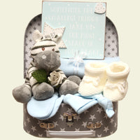 Grayson the giraffe suitcase with baby essentials 