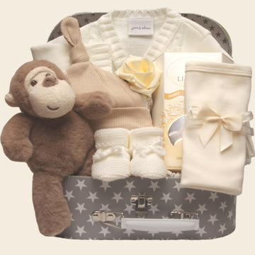 Marcel gift suitcase plush monkey white cardigan with chocolates