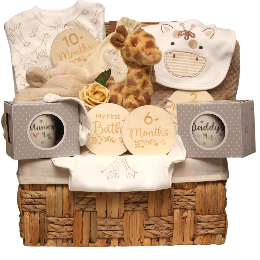 Sunny the Giraffe baby hamper with neutral baby essentials and giraffe theme