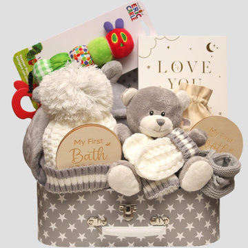 Unisex baby gift suitcase with baby essentials