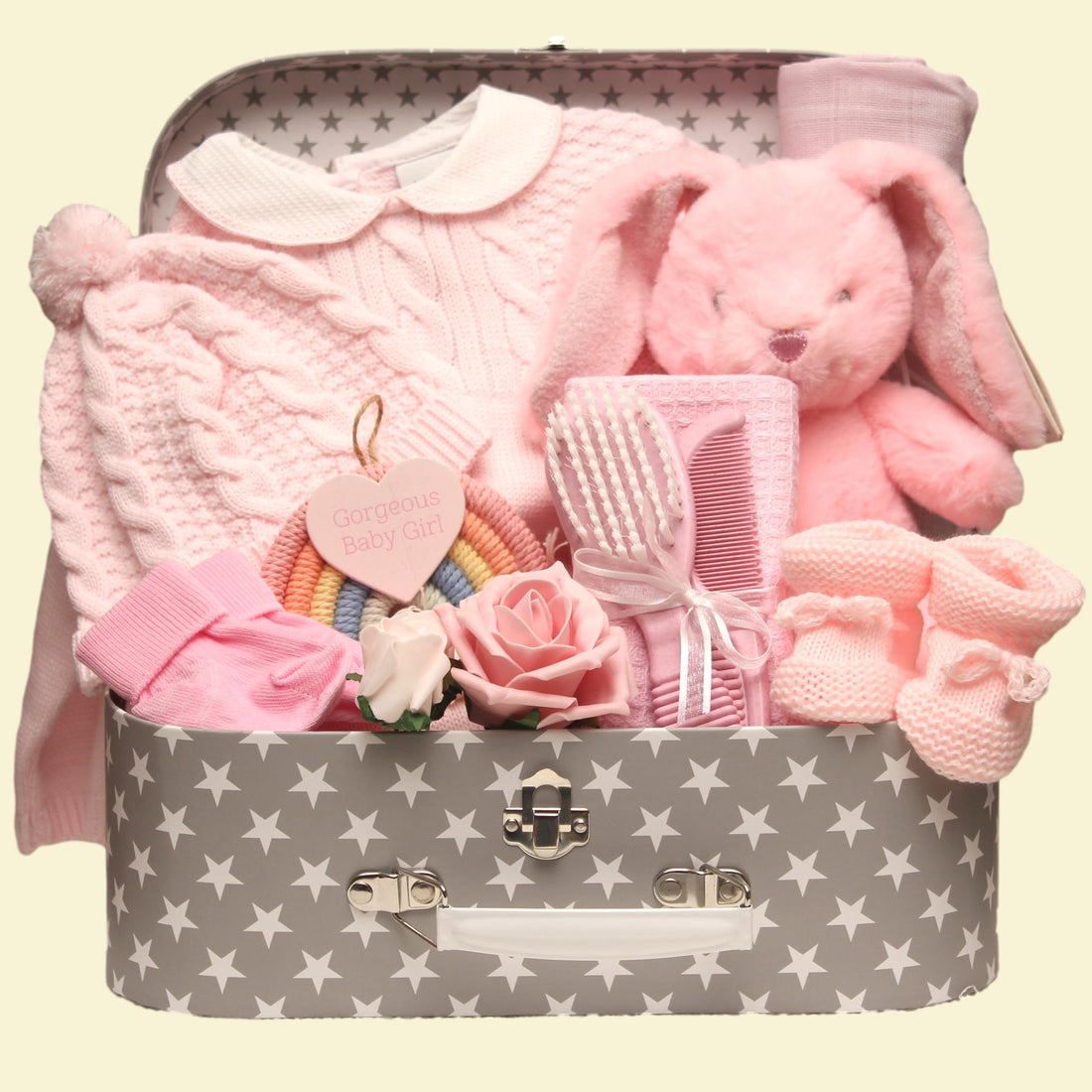 Baby girl suitcase filled with essentials perfect for new parents