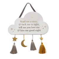 Cloud nursery plaque with “Read me a story, tuck me in tight” bedtime quote, gold moon and star details with tassels