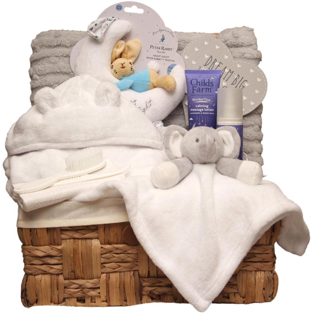 Luxury unisex newborn bedtime hamper featuring neutral blanket, comforter, soft toy and calming baby skincare